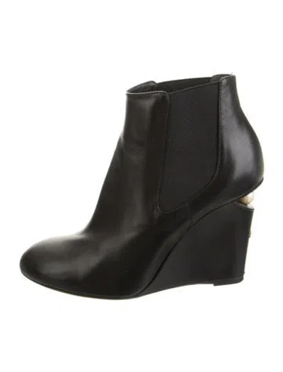 Pre-owned Chanel 2015 Interlocking Cc Logo Chelsea Boots In Black
