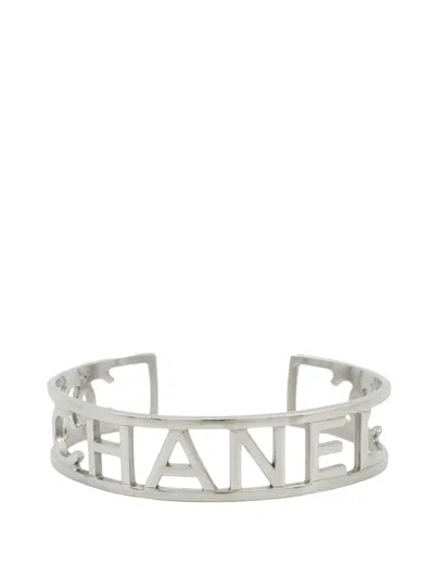Pre-owned Chanel 2015 Silver Plated Cutout Logo Cuff Bracelet Costume Bracelet