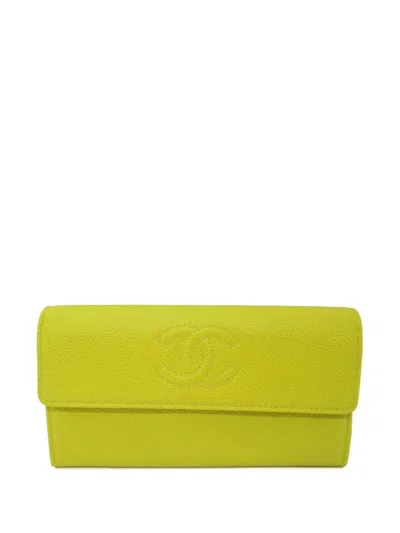 Pre-owned Chanel 2016-2017 Cc Stitch Flap Wallet In Yellow