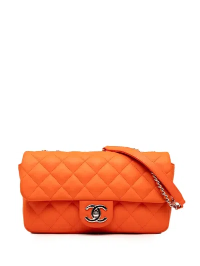Pre-owned Chanel 2016-2017 Medium Quilted Lambskin Rubber Coco Rain Flap Shoulder Bag In Orange