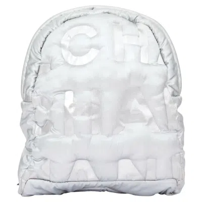 Pre-owned Chanel 2017 Karl Lagerfeld Doudoune Embossed Metallic Nylon Small Backpack In Gray