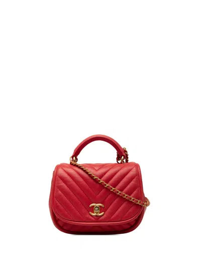 Pre-owned Chanel 2017-2018 Mini Cc Chevron Lambskin Reversed Round Flap Satchel In Red