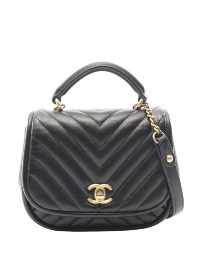 Pre-owned Chanel 2017-2018 Mini Reverse Quilted Chevron Lambskin Round Satchel In Black
