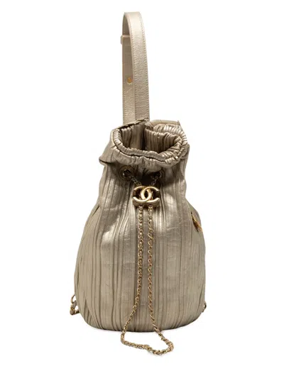 Pre-owned Chanel 2018 Small Metallic Calfskin Coco Pleats Drawstring Backpack In Gold