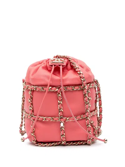 Pre-owned Chanel 2020 Lambskin Cc Chain Frame Drawstring Bucket Bag In Pink