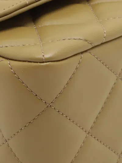 Pre-owned Chanel 2021-2025 Cc Quilted Lambskin Metal Twist Top Handle Flap Satchel In Brown