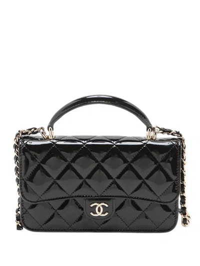 Pre-owned Chanel 2021-2025 Cc Quilted Patent Top Handle Phone Holder With Chain Satchel In Black
