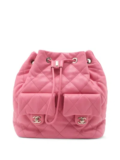 Pre-owned Chanel 2021-2025 Quilted Lambskin Pockets Drawstring Backpack In Pink
