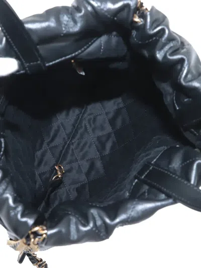 Pre-owned Chanel 2021-2025 Small Shiny Quilted Calfskin 22 Backpack In Black