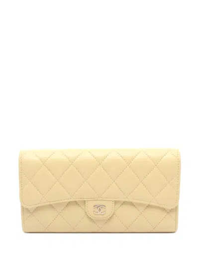 Pre-owned Chanel 2021 Cc Quilted Calfskin Wallet Long Wallets In Yellow
