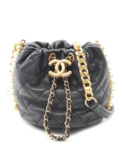 Pre-owned Chanel 2021 Mini Quilted Calfskin About Pearls Drawstring Bucket Bag In Black