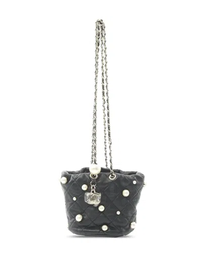 Pre-owned Chanel 2021 Mini Quilted Lambskin About Pearls Drawstring Bucket Bag In Black