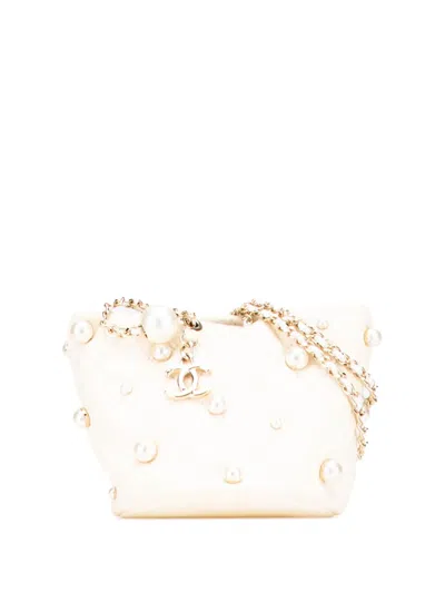 Pre-owned Chanel 2021 Mini Quilted Lambskin About Pearls Drawstring Bucket Bag In White