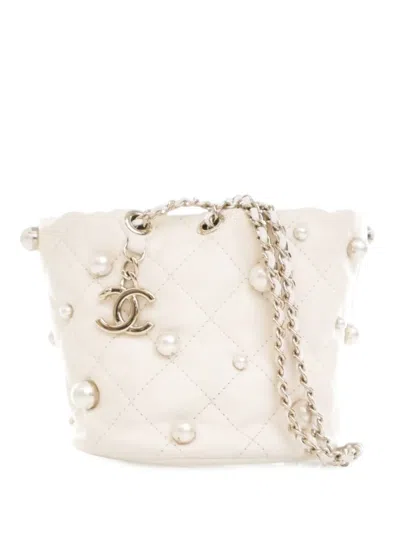 Pre-owned Chanel 2021 Mini Quilted Lambskin About Pearls Drawstring Bucket Bag In White