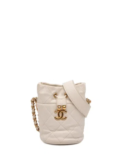Pre-owned Chanel 2021-2025 Mini Quilted Caviar Twist Your Buttons Drawstring Bucket Bag In White