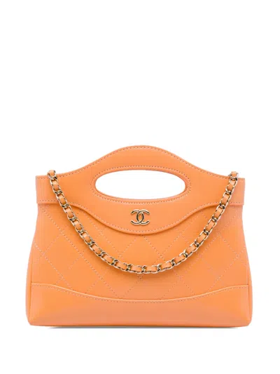Pre-owned Chanel 2021-2026 Nano Shiny Crumpled Calfskin 31 Shopping Bag Satchel In Orange