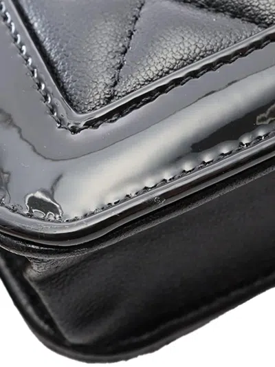 Pre-owned Chanel 2021-2026 Quilted Lambskin And Patent Hold The Line Wallet On Chain Crossbody Bag In Black