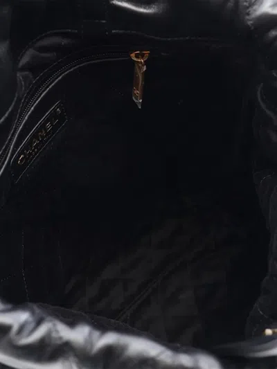 Pre-owned Chanel 2021-2026 Small Shiny Quilted Calfskin 22 Backpack In Black
