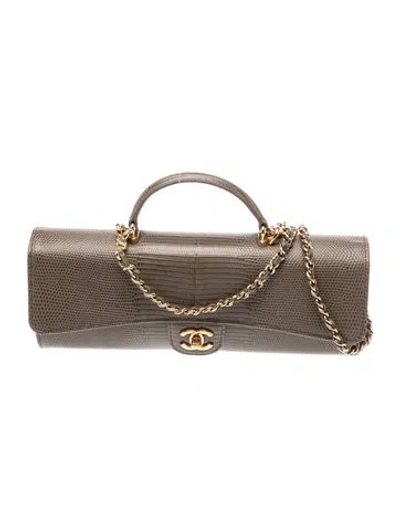 Pre-owned Chanel 2026 Paris-new York Lizard Embossed Long Top Handle Clutch W/ Chai In Brown