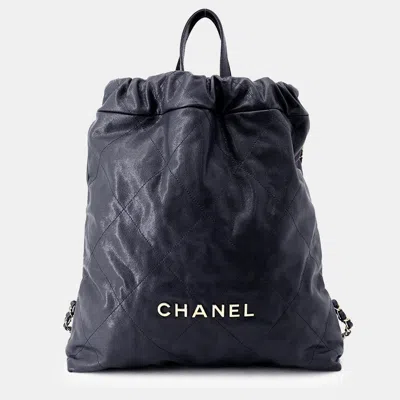Pre-owned Chanel 22 Backpack Navy Caviar Leather Size Large In Blue