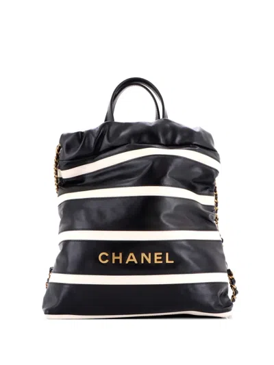 Pre-owned Chanel 22 Chain Striped Shiny Calfskin Medium Backpack In Black