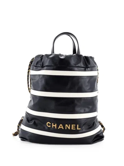 Pre-owned Chanel 22 Chain Striped Shiny Calfskin Medium Backpack In Black