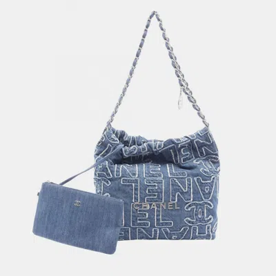 Pre-owned Chanel 22 Small Fringed Logo Quilted Denim Chain Hobo Bag In Blue