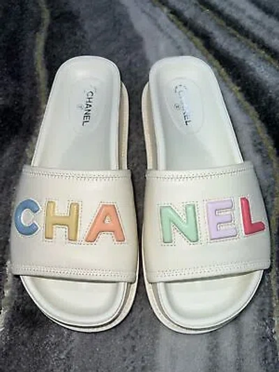 Pre-owned Chanel 22s Ivory Lambskin Multicolor Cha Nel Letter Logo Flat Slide Sandal 37.5 In White