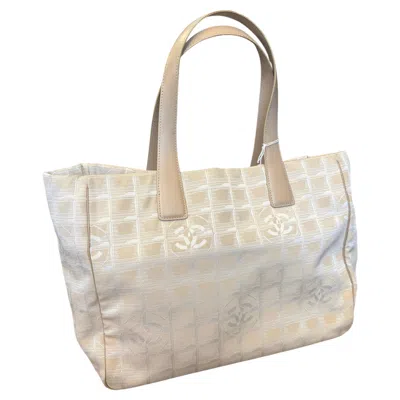 Pre-owned Chanel A 2003  New Travel Line Beige Nylon And Brown Leather Tote Bag