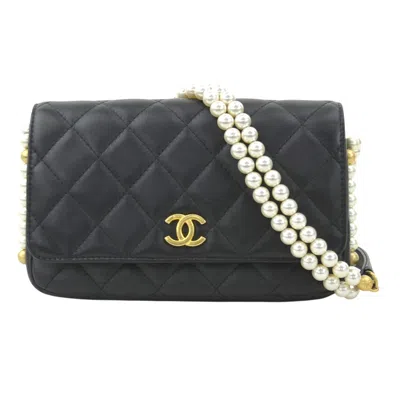 Pre-owned Chanel Artificial Ivory Leather Chain/shoulder Wallet () In Black
