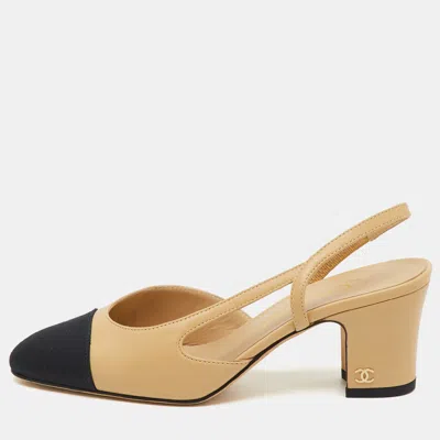Pre-owned Chanel Beige/black Leather And Canvas Cc Cap Toe Slingback Pumps Size 35 In Sand