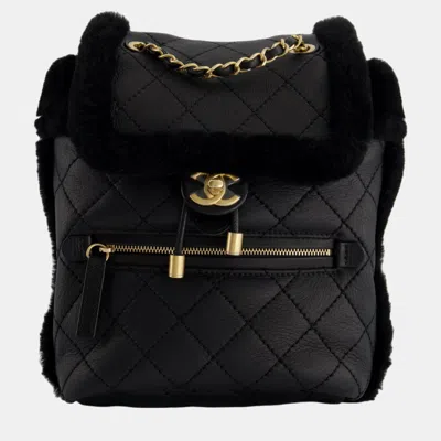 Pre-owned Chanel Black Calfskin Quilted Leather And Shearling Backpack With Brushed Gold Hardware