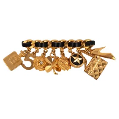 Pre-owned Chanel Black Leather And Golden Metal Brooch Fall, 1995