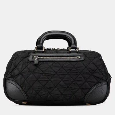 Pre-owned Chanel Black Paris New York Quilted Nylon Duffle Handbag