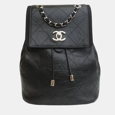 Pre-owned Chanel Black Quilted Aged Calfskin And Grosgrain Small Drawstring Cc Flap Backpack