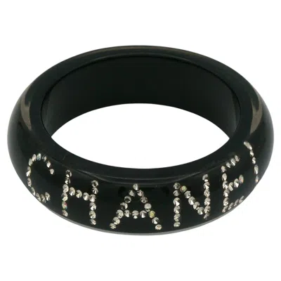 Pre-owned Chanel Black Resin Crystal Logo Inlaid Wide Bangle Bracelet Fall 2003