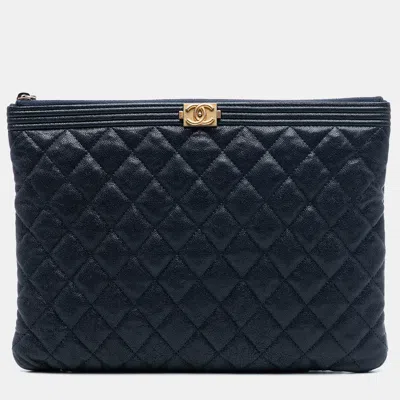 Pre-owned Chanel Blue Medium Quilted Caviar Boy O Case Clutch