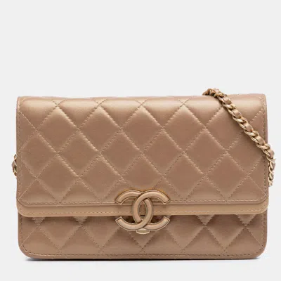 Pre-owned Chanel Brown Quilted Metallic Lambskin Cc Chic Wallet On Chain