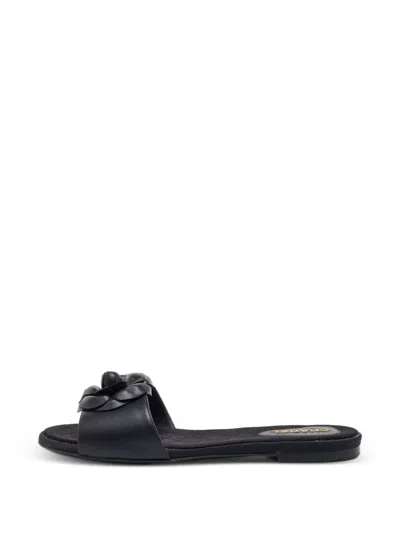 Pre-owned Chanel Cc Camellia Leather Flat Sandals In Black