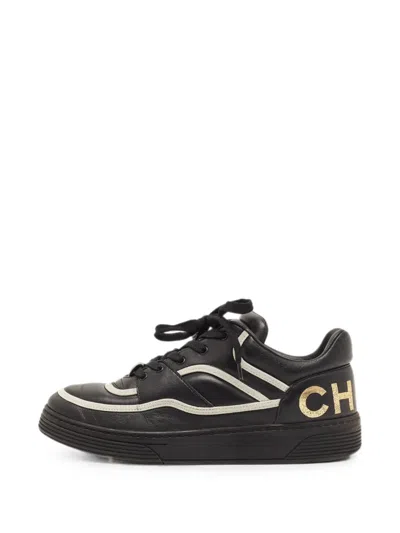 Pre-owned Chanel Cc Camellia Sneakers In Black