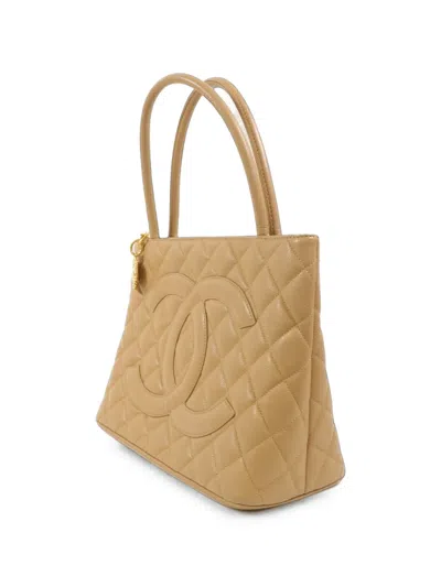 Chanel Cc Medallion Leather Tote Bag In Black
