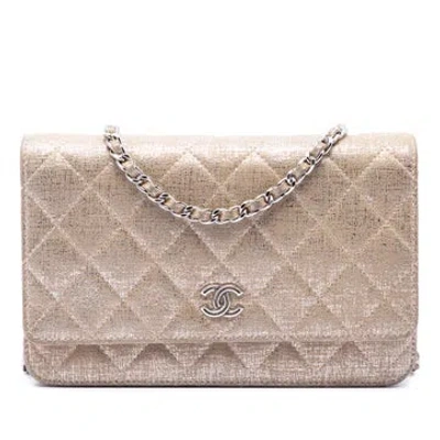 Pre-owned Chanel Cc Quilted Metallic Fabric Wallet On Chain In Gold
