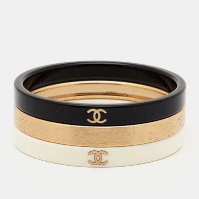 Pre-owned Chanel Cc Resin Gold Tone Stacking Bangle Set Of 3
