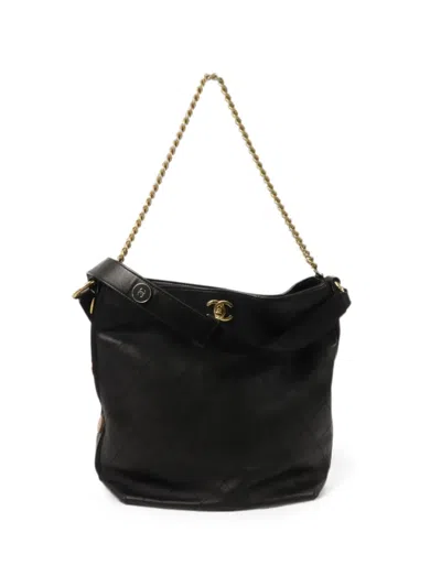 Chanel Cc Turn-lock Diamond-quilted Bucket Bag In Black