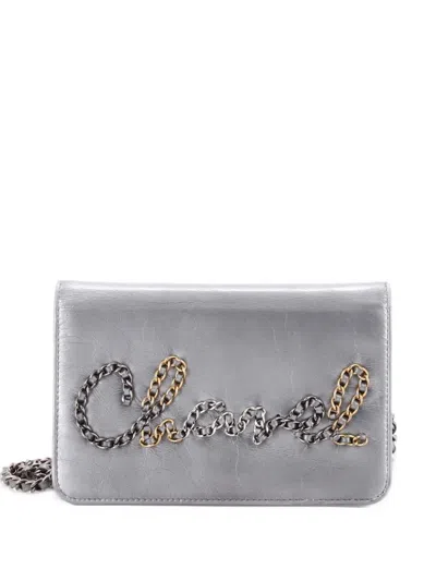 Pre-owned Chanel Chain Signe Wallet On Chain Calfskin Crossbody Bag In Silver