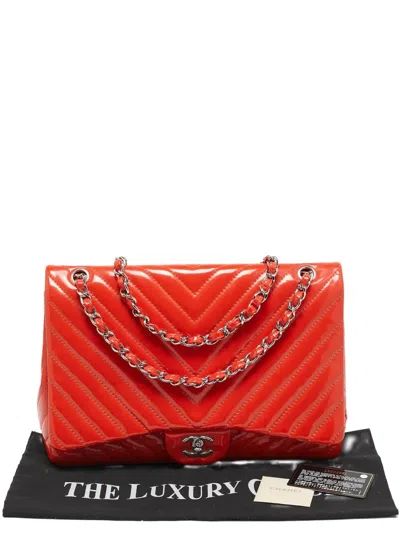 Pre-owned Chanel Chevron Patent Leather Bag In Orange