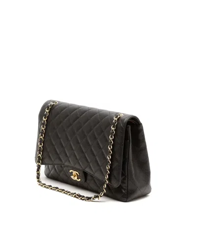 Chanel Classic Caviar Maxi Double Flap Bag In Black