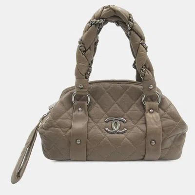 Pre-owned Chanel Distressed Lambskin Lady Braid Bowler Handbag In Beige