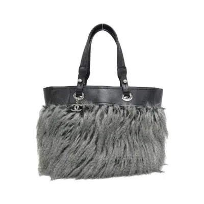 Pre-owned Chanel Fur Handbag () In Black