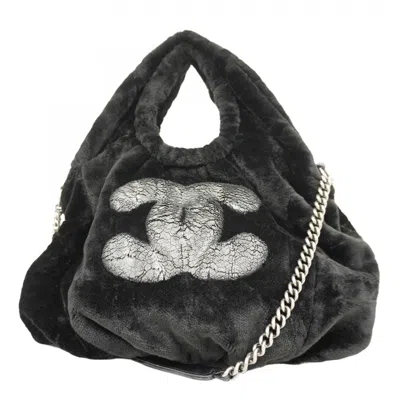 Pre-owned Chanel Fur Handbag () In Black